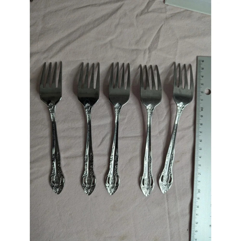 7 lot H.F. LTD Stainless stamped flower pattern 7